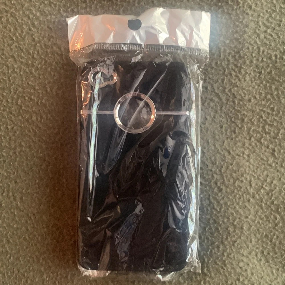 NIP black and silver phone cover and one GUC black and silver phone cover.